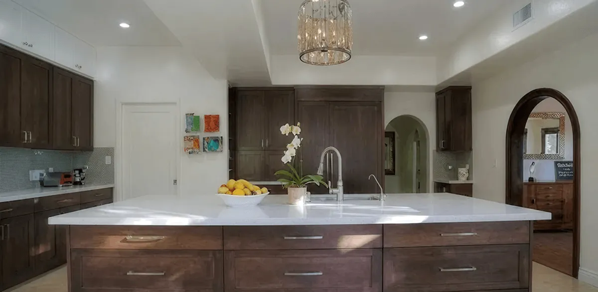 Cabinet refacing project with updated kitchen cabinets and island in Fresno, CA